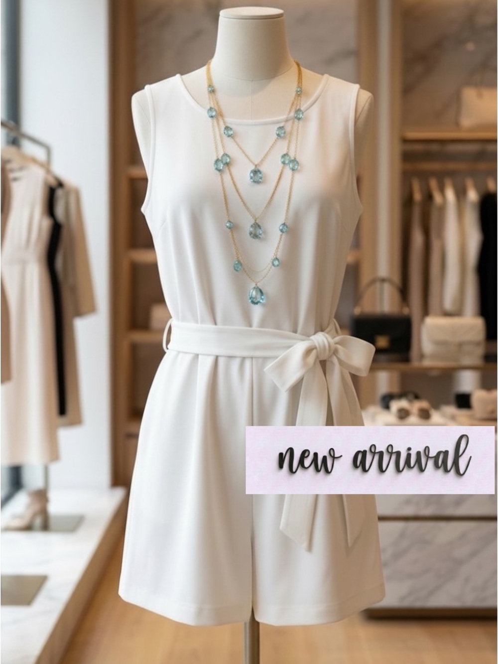NWOT Cream Sleeveless Romper with Sash